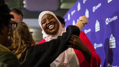 Labour's Sagal Abdi-Wali is embraced by a supporter after winning the Holborn and St Pancras by-election. Getty Images