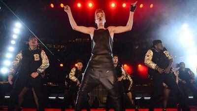 Justin Bieber faced a hostile homecoming during his halftime performance at a Canadian football game. Sean Kilpatrick / The Canadian Press / AP Photo.