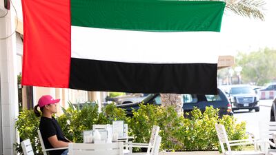 Flag outside a coffee shop in Dubai to celebrate flag day. Ruel Pableo for The National