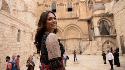 Meza wore a flowing, full-length dress with flat sandals as she toured the Old City. AP