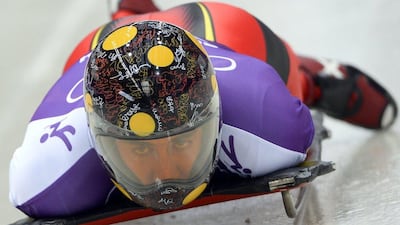 Spaniard Ander Mirambell's helmet takes on a pop-art feel. Lionel Bonaventure / AFP