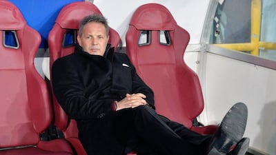 AC Milan manager Sinisa Mihajlovic sits on the bench prior to the Coppa Italia semi-final first leg against Alessandria. Alessandro Di Marco / EPA
