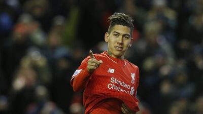 Football Soccer - Liverpool v Manchester City - Barclays Premier League - Anfield - 2/3/16Liverpool's Roberto Firmino celebrates scoring their third goalReuters / Phil NobleLivepicEDITORIAL USE ONLY. No use with unauthorized audio, video, data, fixture lists, club/league logos or "live" services. Online in-match use limited to 45 images, no video emulation. No use in betting, games or single club/league/player publications. Please contact your account representative for further details.