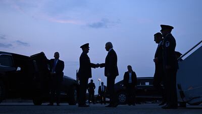 US President Joe Biden is greeted by troops after arriving at Joint Base Andrews in Maryland. He returned to Washington, DC after spending the day in Connecticut. AFP