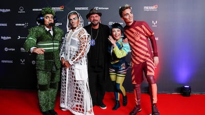 Cirque du Soleil's founder Guy Laliberte and artists pose during the premiere of the "Messi10" show. Reuters