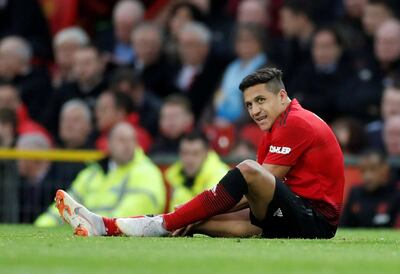 Manchester United's Alexis Sanchez reacts after sustaining an injury. The former Barcelona star ha struggled at Old Trafford this season. Carl Recine / Reuters