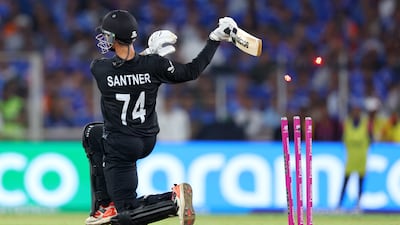 New Zealand batter Mitchell Santne is bowled by Jasprit Bumrah of India for 43. Getty Images
