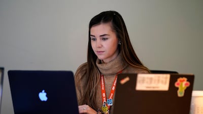 US teachers like Cristin Espinoza from RISE school in Denver have been working remotely, but many are being called back into the classroom. AP