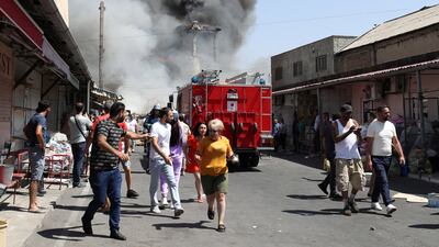 A pall of smoke rises into the sky from the explosions and blaze. Reuters