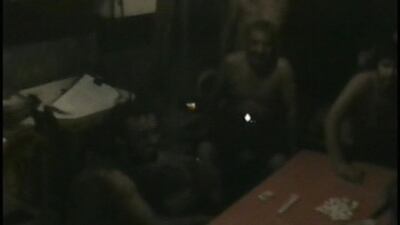 A video grab shows the miners trapped underground, August 27, 2010. REUTERS