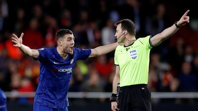 Chelsea's Mateo Kovacic argues with referee Felix Zwayer. Reuters