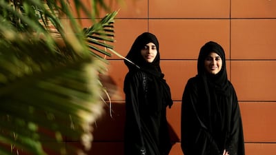 Young artists Maryam Alatouly, left, and Maitha Alfalasi outside twofour54’s The Space in Abu Dhabi. Christopher Pike / The National