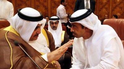 Bahraini Foreign Minister Sheikh Khaled bin Ahmed Al Khalifa (L) and Minister of Foreign Affairs of the United Arab Emirates Sheikh Abdullah bin Zayed Al Nahyan (R), attend the Arab Foreign Ministers emergency meeting on Syria, at the Arab League Headquarters in Cairo, Egypt.