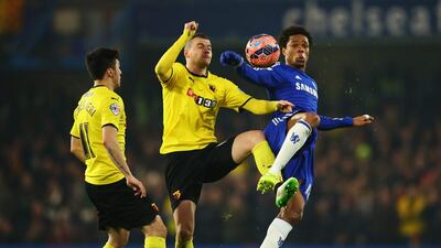 Loic Remy of Chelsea battles with Daniel Pudil, centre, and Fernando Forestieri of Watford during their FA Cup third round match on Sunday. Richard Heathcote / Getty Images