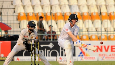 England's Harry Brook plays a reverse sweep en route to a century against Pakistan. EPA