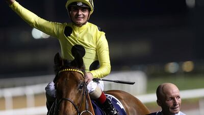 Dubai, United Arab Emirates-March,26, 2016: Jockey Andrea Atzeni riding Postponed wins the Race8 Dubai Sheema Classic sponsored by Longines during the Dubai World Cup at the Meydan Racecourse in Dubai. ( Satish Kumar / The National ) ID No: 53060Section: Sports