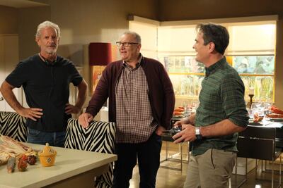 Executive producer Christopher Lloyd, and actors Ed O'Neill and Ty Burrell on the set of 'Modern Family'. AP