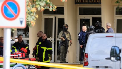 French police, soldiers and firefighters at Gambetta high school in Arras after a teacher was killed and three others injured in a knife attack on Friday. Reuters