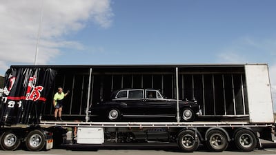 The Rolls Royce Phantom VI used to carry Queen Elizabeth II is loaded on to a truck after her departure from Australia in 2006.