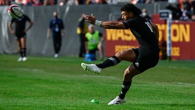 Richie Mo'unga of the All Blacks kicks a conversion. AFP