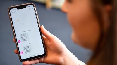 Students are even more glued to their phones than usual as they await their results. REUTERS