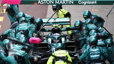 Sebastian Vettel of Aston Martin makes a pitstop. Getty
