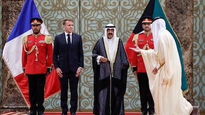A welcoming ceremony for Mr Macron. Reuters