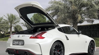 Idiosyncratic metallic door handles add character to the car. Chris Whiteoak / The National