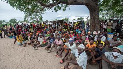 Internally displaced persons gather for a community meeting in the Tara Tara district of Matuge, northern Mozambique. The place functions as a center for internally displaced persons (IDPs) who fled their communities due to attacks by armed insurgents in the northern part of the Cabo Delgado province. Currently, there are 500 families, according to government figures. AFP