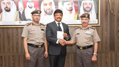 Sharjah’s first golden card recipient was Lalu Samuel, chairman and managing director of Kingston Holdings and Chairman of Sharjah Industry Business Group. Photo: Kingston Holdings