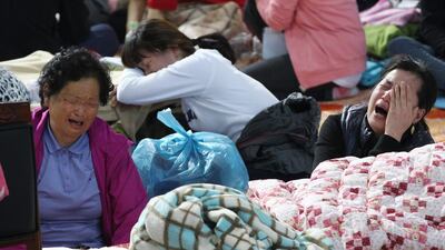 Scuffles broke out when they were prevented from crossing the bridge to the mainland by a large police detachment, and eventually they were forced to turn back. Ahn Young-joon / AP Photo
