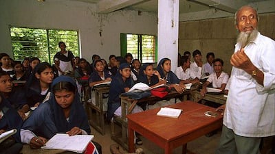 Boy and girl pupils study together at a madrasa in West Bengal, a practice that has been prohibited in Uttar Pradesh.
