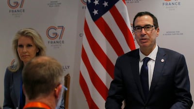 After meeting with G7 ministers and central bankers, US Treasury Secretary Steve Mnuchin warned the EU to not breach Washington sanctions when trading with Iran. AP Photo/Michel Euler