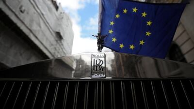 A Rolls Royce car with an EU flag attached to it is seen on a street in London, Britain, March 27, 2019. REUTERS/Hannah McKay