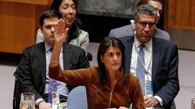 US ambassador to the United Nations Nikki Haley votes for a resolution to renew the Joint Investigative Mechanism for another year during a meeting of the UN Security Council in New York on November 17, 2017. Brendan McDermid / Reuters