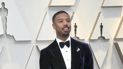 2019: Michael B Jordan wears a midnight blue velvet dinner jacket by Tom Ford at the 91st Annual Academy Awards on February 24, 2019. Getty Images