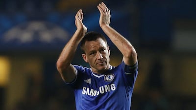 John Terry and Chelsea finished atop Group E with 12 points from six matches. Sang Tan / AP