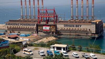 The Turkish floating power station Karadeniz Powership Orhan Bey, which generates electricity to help ease the strain on the country's woefully under maintained power sector, is docked near the Jiyeh power plant, south of Beirut, Lebanon, Monday, April 8, 2019. (AP Photo/Hussein Malla)
