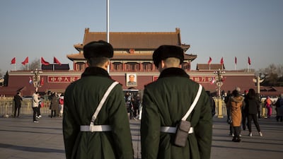 Members of the Chinese People's Armed Police stand guard in Tiananmen Square in Beijing. Giulia Marchi / Bloomberg