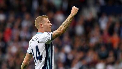 West Brom midfielder James McClean celebrates after scoring their third goal against West Ham. Ben Stansall / AFP