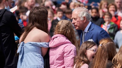 Britain's Prince Charles greets people as he arrives at the Confederation Building in St John’s. AFP