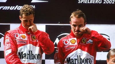 Michael Schumacher, Rubens Barrichello and the Ferrari team came under heavy criticism in 2002 after the team ordered the Brazilian to allow the German to pass on the last lap of the Austrian Grand Prix to take the win. Tom Shaw / Getty Images