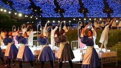 Nurses representing Great Ormond Street, which provides paediatric training and support in Dubai, and the NHS take part in the opening ceremony of the London 2012 Olympic Games.