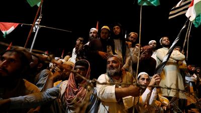 Supporters listen to the speeches of their leaders. Reuters