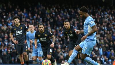 Raheem Sterling scores the penalty that earns Manchester City a 1-0 win over Wolves at Etihad Stadium on Saturday. AFP