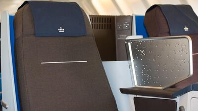 Dutch industrial designer Hella Jongerius blended in five warmer colours – aubergine, dark brown, midnight blue, cobalt and dark grey – in the carrier's signature blue hue. Courtesy KLM