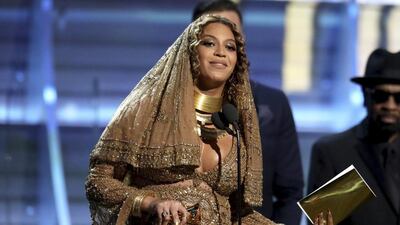 Beyoncé accepts the award for best urban contemporary album for Lemonade. Matt Sayles / Invision / AP