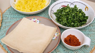 Tunisian brik is stuffed with parsley, cubed potatoes and spices, as well as shrimp and tuna. Victor Besa / The National