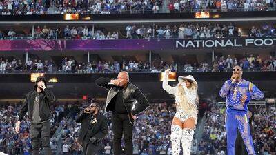From left, Eminem, Kendrick Lamar, Dr Dre, Mary J Blige and Snoop Dogg come together at the end of the half-time show for the NFL Super Bowl LVI football game. AP