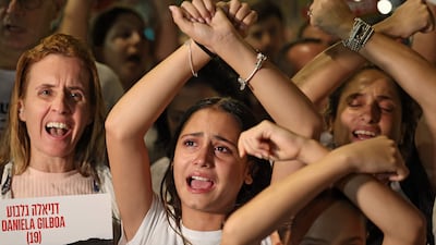 Israelis attend a rally calling for the release of hostages abducted by Hamas, in Tel Aviv. AFP